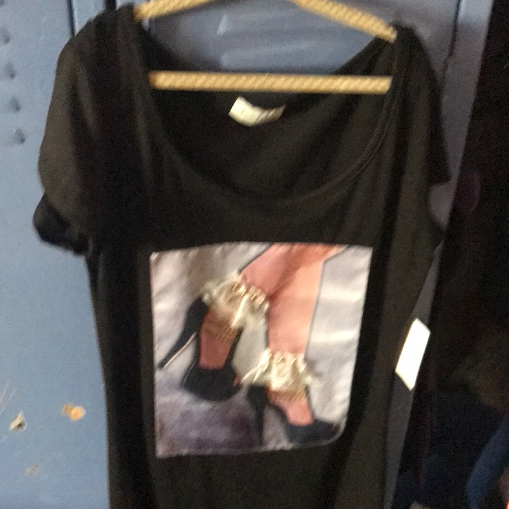 I’m selling a black made in Mexico black dress with the print of high heels